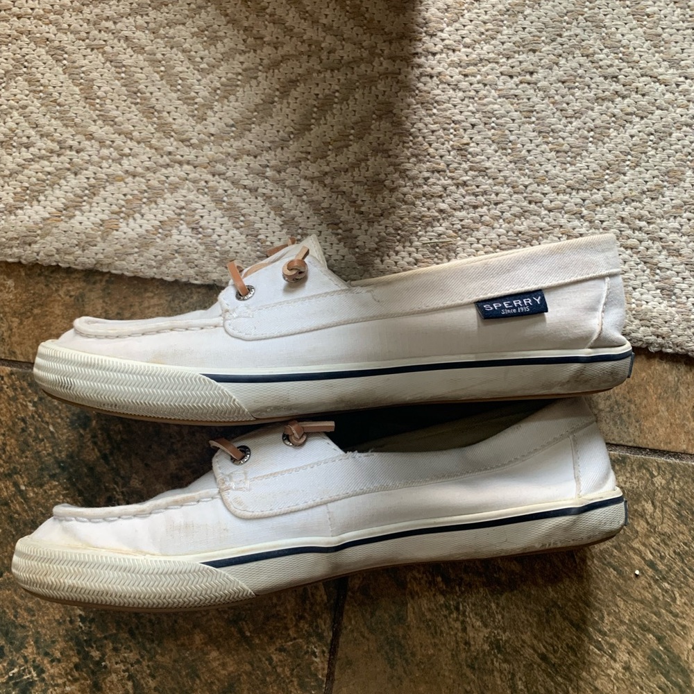 White slip on Sperry shoes. Size 9.